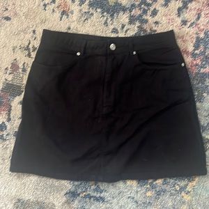 Short black jean skirt